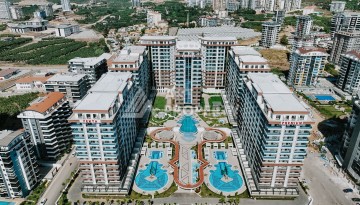 Апартаменты планировки 3+1, 190м2 в районе Махмутлар - Ракурс 1