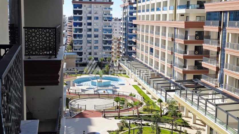 Апартаменты планировки 3+1, 190м2 в районе Махмутлар - Ракурс 8