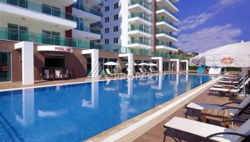 Светлая квартира 2+1 с гарантированным ВНЖ в районе Тосмур, 300 м до моря - Ракурс 2