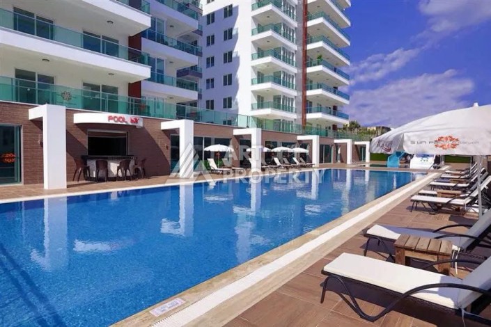 Светлая квартира 2+1 с гарантированным ВНЖ в районе Тосмур, 300 м до моря - Ракурс 1