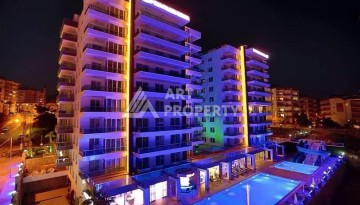 Светлая квартира 2+1 с гарантированным ВНЖ в районе Тосмур, 300 м до моря - Ракурс 3