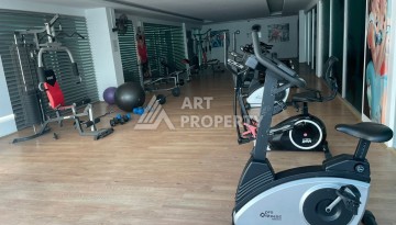 Светлая квартира 2+1 с гарантированным ВНЖ в районе Тосмур, 300 м до моря - Ракурс 12