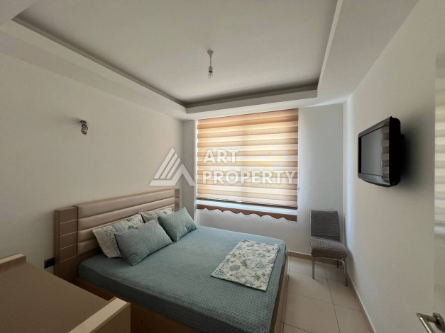 Светлая квартира 2+1 с гарантированным ВНЖ в районе Тосмур, 300 м до моря - Ракурс 17