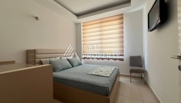 Светлая квартира 2+1 с гарантированным ВНЖ в районе Тосмур, 300 м до моря - Ракурс 19