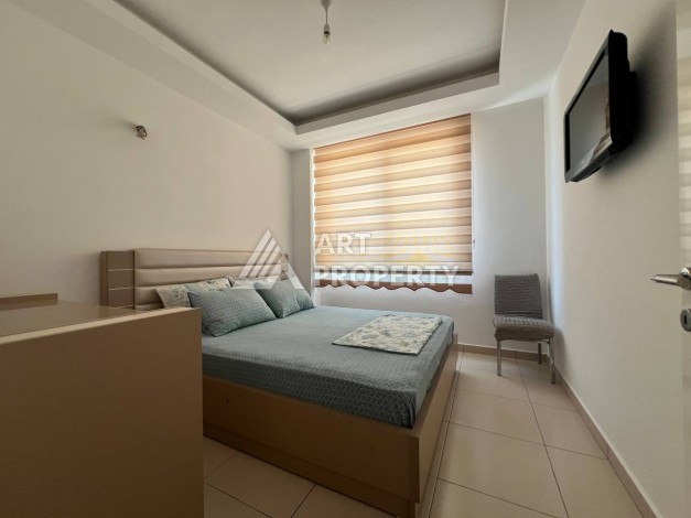 Светлая квартира 2+1 с гарантированным ВНЖ в районе Тосмур, 300 м до моря - Ракурс 18