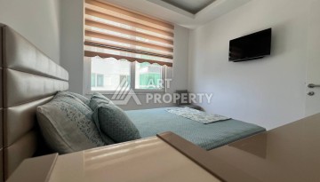 Светлая квартира 2+1 с гарантированным ВНЖ в районе Тосмур, 300 м до моря - Ракурс 20