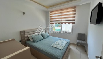 Светлая квартира 2+1 с гарантированным ВНЖ в районе Тосмур, 300 м до моря - Ракурс 27