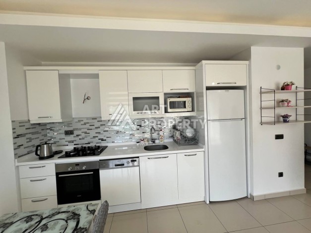 Светлая квартира 2+1 с гарантированным ВНЖ в районе Тосмур, 300 м до моря - Ракурс 35