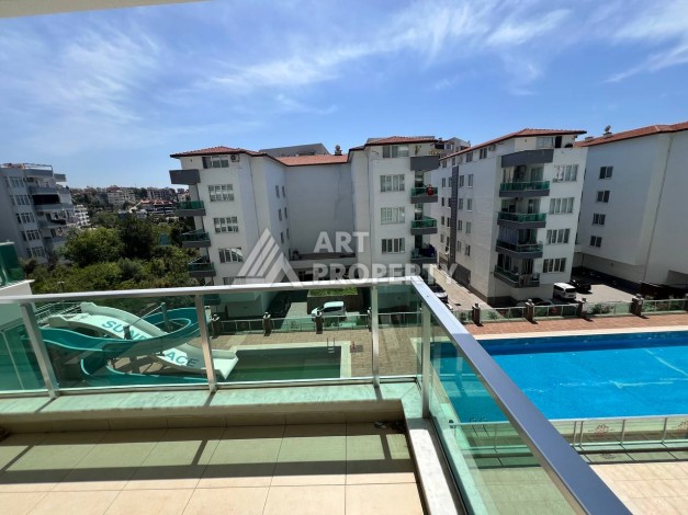 Светлая квартира 2+1 с гарантированным ВНЖ в районе Тосмур, 300 м до моря - Ракурс 48