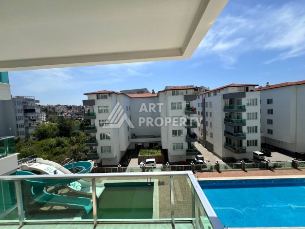 Светлая квартира 2+1 с гарантированным ВНЖ в районе Тосмур, 300 м до моря - Ракурс 50