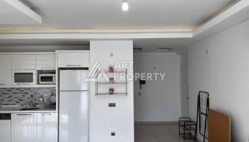 Светлая квартира 2+1 с гарантированным ВНЖ в районе Тосмур, 300 м до моря - Ракурс 52