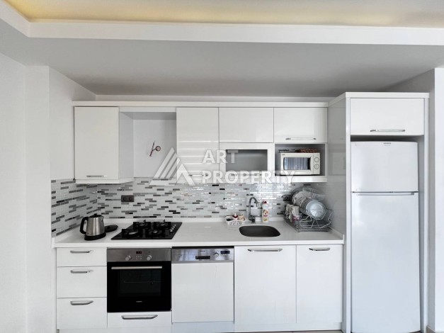 Светлая квартира 2+1 с гарантированным ВНЖ в районе Тосмур, 300 м до моря - Ракурс 52