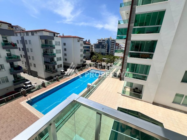 Светлая квартира 2+1 с гарантированным ВНЖ в районе Тосмур, 300 м до моря - Ракурс 53