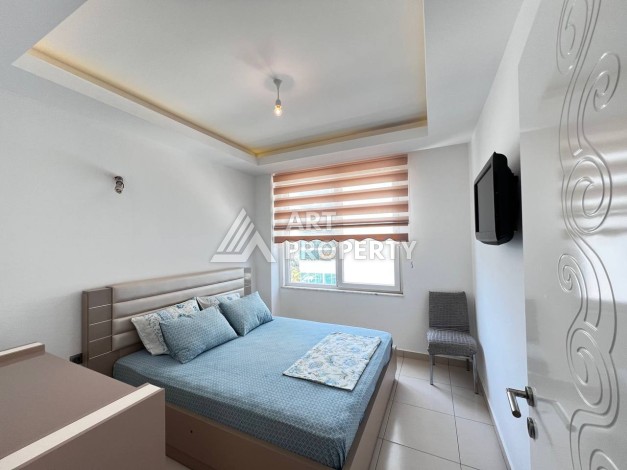 Светлая квартира 2+1 с гарантированным ВНЖ в районе Тосмур, 300 м до моря - Ракурс 57