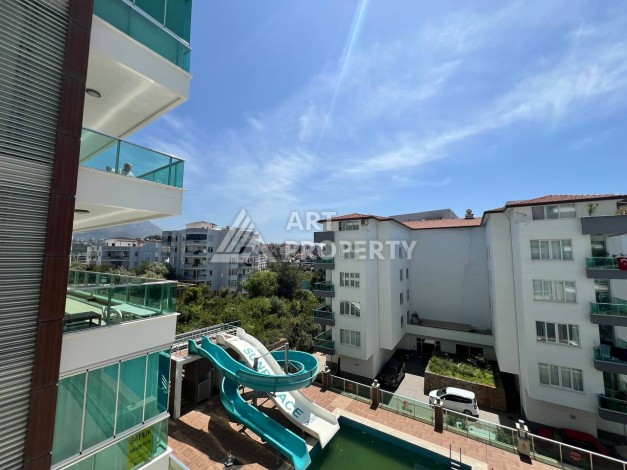 Светлая квартира 2+1 с гарантированным ВНЖ в районе Тосмур, 300 м до моря - Ракурс 58