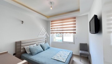 Светлая квартира 2+1 с гарантированным ВНЖ в районе Тосмур, 300 м до моря - Ракурс 61