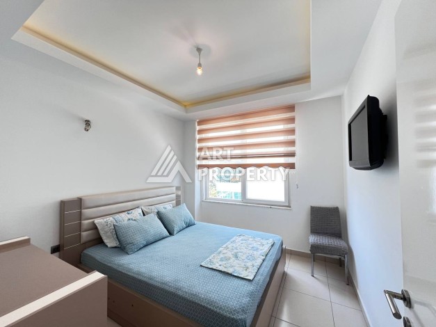 Светлая квартира 2+1 с гарантированным ВНЖ в районе Тосмур, 300 м до моря - Ракурс 60