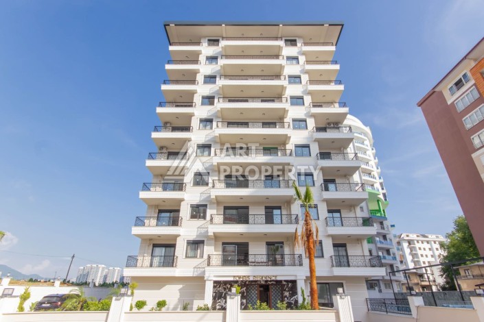 Квартира 1+1 с мебелью в Махмутларе, комфорт в 800 метрах от моря - Ракурс 0