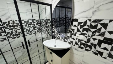 Квартира 1+1 с мебелью в Махмутларе, комфорт в 800 метрах от моря - Ракурс 33