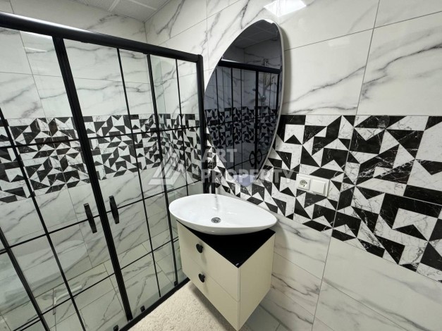 Квартира 1+1 с мебелью в Махмутларе, комфорт в 800 метрах от моря - Ракурс 32