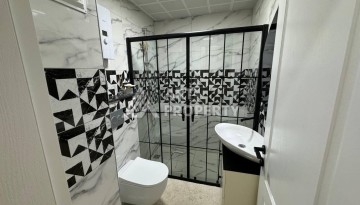 Квартира 1+1 с мебелью в Махмутларе, комфорт в 800 метрах от моря - Ракурс 37