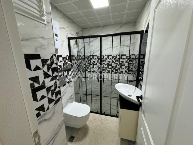 Квартира 1+1 с мебелью в Махмутларе, комфорт в 800 метрах от моря - Ракурс 36