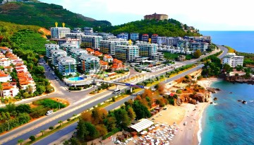 Элитная квартира 1+1 на первой береговой линии с панорамным видом на море в Каргыджаке - Ракурс 1