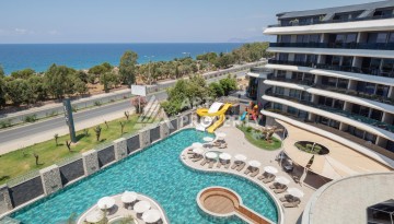 Премиальная квартира 1+1 с панорамным видом на море на первой линии в Каргыджаке - Ракурс 1