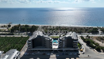 Премиальная квартира 1+1 с панорамным видом на море на первой линии в Каргыджаке - Ракурс 2