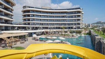 Премиальная квартира 1+1 с панорамным видом на море на первой линии в Каргыджаке - Ракурс 18