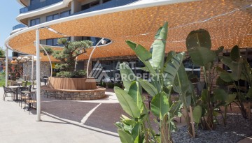 Премиальная квартира 1+1 с панорамным видом на море на первой линии в Каргыджаке - Ракурс 31