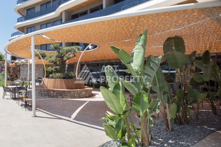 Премиальная квартира 1+1 с панорамным видом на море на первой линии в Каргыджаке - Ракурс 30