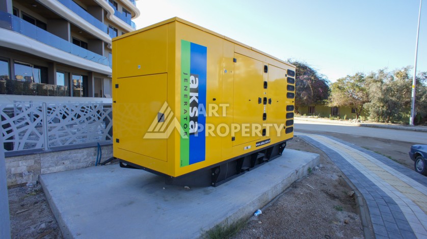 Премиальная квартира 1+1 с панорамным видом на море на первой линии в Каргыджаке - Ракурс 36