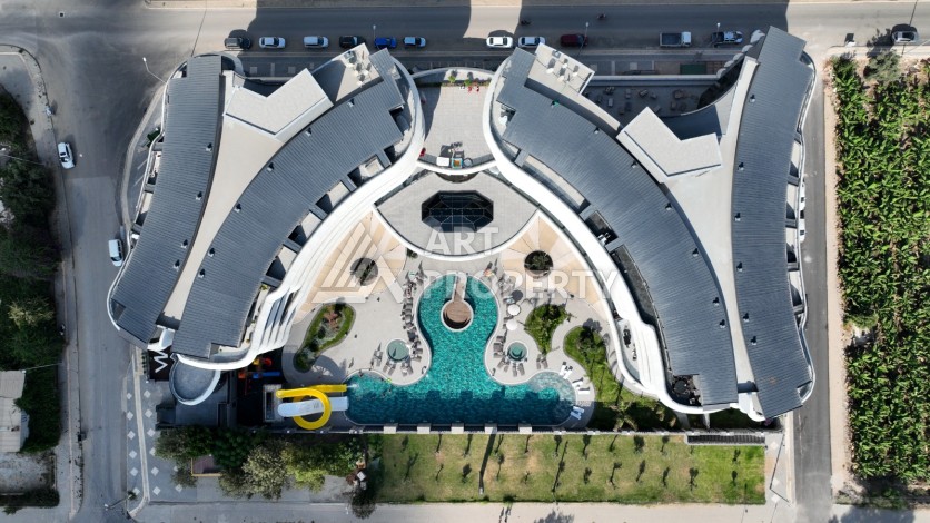 Премиальная квартира 1+1 с панорамным видом на море на первой линии в Каргыджаке - Ракурс 37