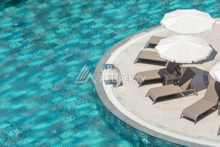 Премиальная квартира 1+1 с панорамным видом на море на первой линии в Каргыджаке - Ракурс 38