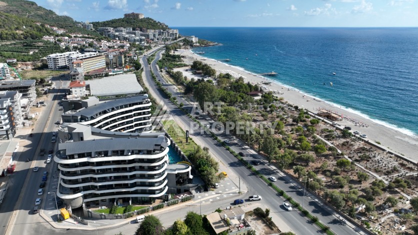 Премиальная квартира 1+1 с панорамным видом на море на первой линии в Каргыджаке - Ракурс 41