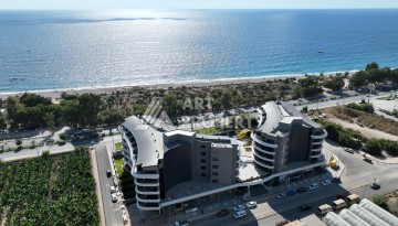 Премиальная квартира 1+1 с панорамным видом на море на первой линии в Каргыджаке - Ракурс 43