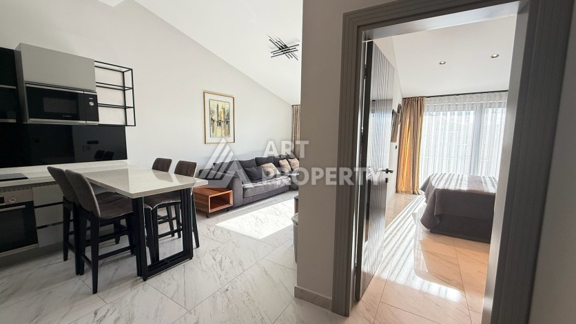 Премиальная квартира 1+1 с панорамным видом на море на первой линии в Каргыджаке - Ракурс 48