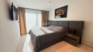 Премиальная квартира 1+1 с панорамным видом на море на первой линии в Каргыджаке - Ракурс 53