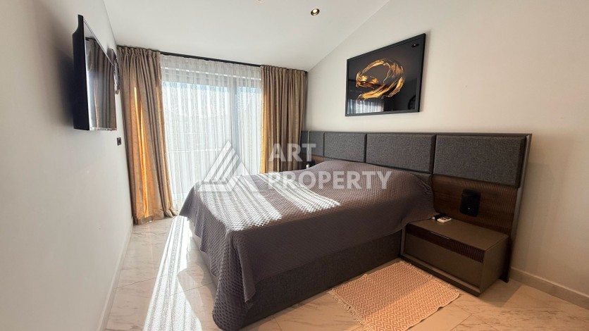 Премиальная квартира 1+1 с панорамным видом на море на первой линии в Каргыджаке - Ракурс 52