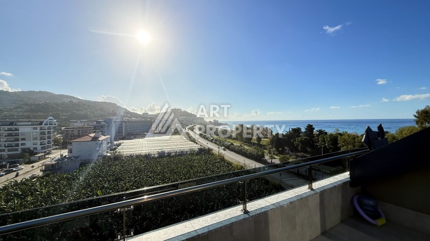 Премиальная квартира 1+1 с панорамным видом на море на первой линии в Каргыджаке - Ракурс 54