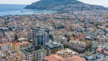 Квартира 1+1 с мебелью в центре Алании, 60 кв.м. - Ракурс 1