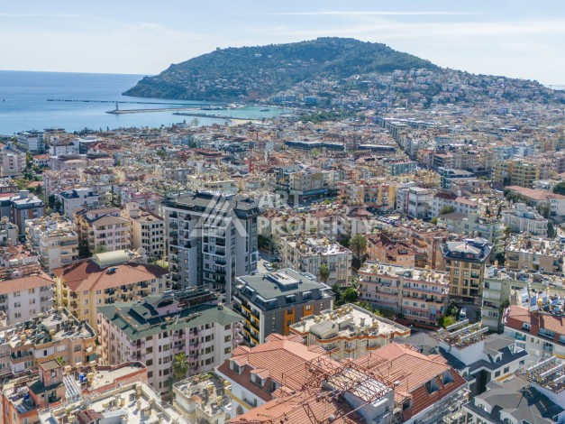 Квартира 1+1 с мебелью в центре Алании, 60 кв.м. - Ракурс 0