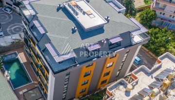 Квартира 1+1 с мебелью в центре Алании, 60 кв.м. - Ракурс 22