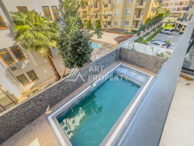 Квартира 1+1 с мебелью в центре Алании, 60 кв.м. - Ракурс 22