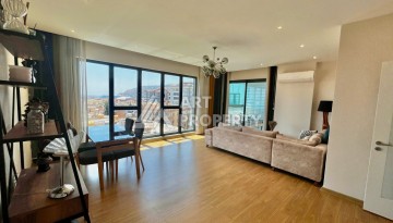 Просторная квартира 3+1 с отдельной кухней и видом на море в центре Алании - Ракурс 1