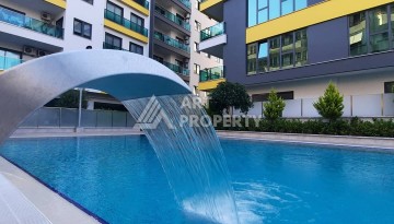 Просторная квартира 3+1 с отдельной кухней и видом на море в центре Алании - Ракурс 4