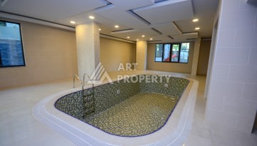 Просторная квартира 3+1 с отдельной кухней и видом на море в центре Алании - Ракурс 6