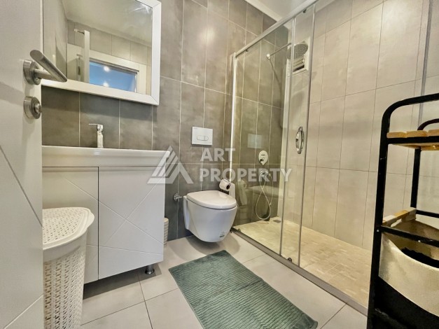 Просторная квартира 3+1 с отдельной кухней и видом на море в центре Алании - Ракурс 7