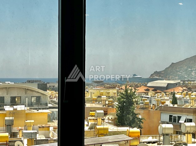 Просторная квартира 3+1 с отдельной кухней и видом на море в центре Алании - Ракурс 10